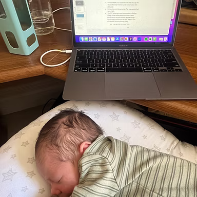 Lucy working at laptop