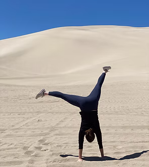 Lucy doing a handstand